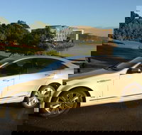 Limo from Proserpine airport to Airlie Beach - Grafton Accommodation