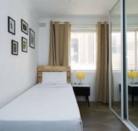 Manly Beachfront Apartment - Grafton Accommodation
