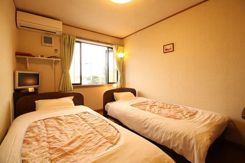 Honeybee Farm Country Cottages - Grafton Accommodation 0