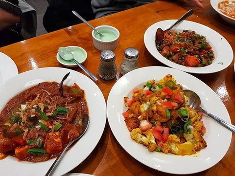 Aman Indian Restaurant - Grafton Accommodation 0