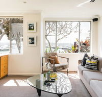 Waterfront Apartment Brimming with Inspirational Artwork - Grafton Accommodation